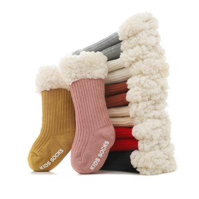 China Free Shipping Antibacterial Winter Kids Fleece Thicker Piece Hogs Babies Solid Color Non-Slip Ribbed Home Socks for sale