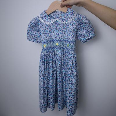 China Washable 20 dollars to proof blue short sleeve floral o-neck skirt smocked kids dress new year wholesale smocked dresses for sale