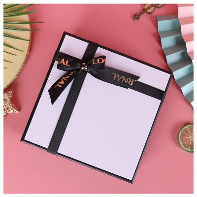 China Custom Biodegradable Logo Beautiful Design Ribbon Rigid Cardboard Paper Jewelry Gift Box for sale