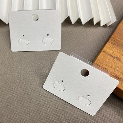 China Recyled Bending Hang Cardboard Fashion White Earrings Paper Card Tags For Jewelry Ornament for sale