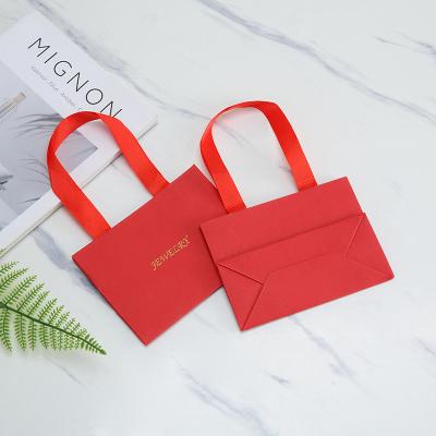 China Suppliers Wholesale Custom Biodegradable Paper Bags Jewelry Cardboard Corrugated Paper Shopping Bag for sale