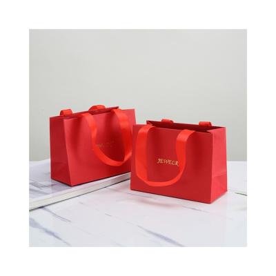 China Custom Logo Printed Red Wholesale Jewelery Biodegradable Hot Stamping Paper Bags Suppliers for sale