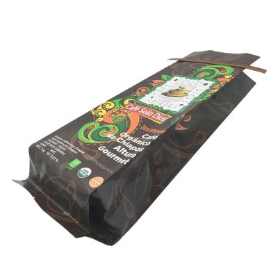 China Safety Recycled 250g Embossing Glossy Matte Beans Lined Brown Kraft Coffee Packaging Paper Bag With One Way Valve for sale