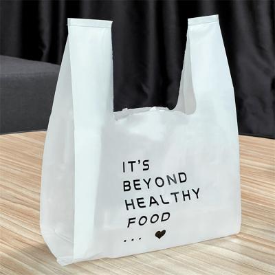 China Supermarket BIODEGRADABLE Bag White Transparent Biodegradable Customized Shopping Plastic Bags With Logos for sale