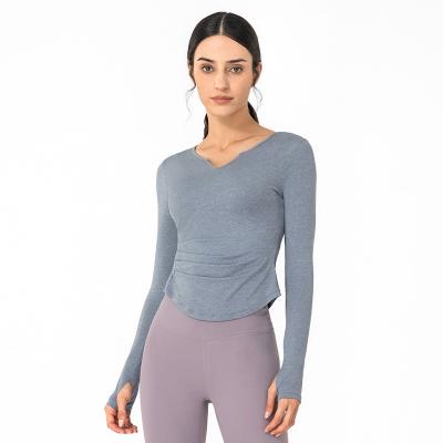 China Breathable Yoga For Women Sporty Running V Neck Yoga Top Stretch Long Sleeves for sale