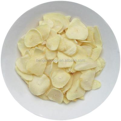 China Dry with dry/dehydrated garlic flakes/without roots for sale