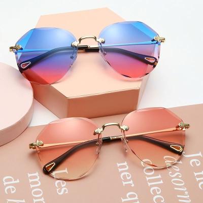 China Fashion Sunglasses Shape Metal Round Sun Glasses Women Sunglasses Ocean Color Lens for sale