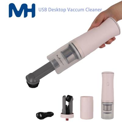 China Hotel Low Price With Strong Suction Power USB And Type C Mini Handheld Desktop Keyboard Smart Vacuum Cleaner for sale