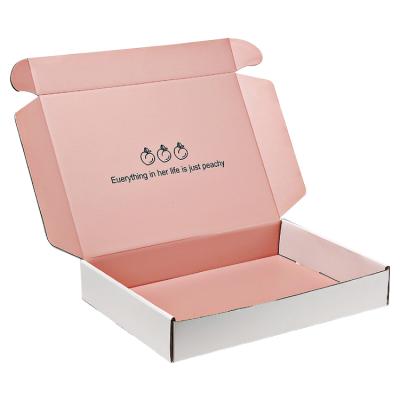 China Recycled Materials Corrugated Cosmetics Packaging Shipping Custom Logo Package Box For Clothes for sale