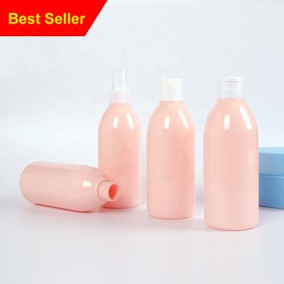 China 300ml 10oz Cosmetic Pet Plastic Bottles Empty Round Shape Pink Bottle With White Black Disc Top Cap for sale