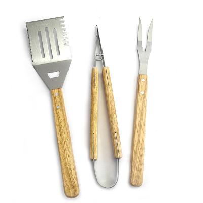 China Easily Cleaned Stainless Steel BBQ Grill Tool Kit Of 3 Including Fork Turner Tong With Wood Handle For Grilling Kitchen Accessories for sale