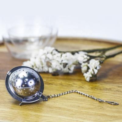 China High Quality Novelty Stainless Steel Metal Ball Shape Tea Strainer Viable Tea Infuser With Two Different Side for sale