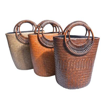 China Fashion New hot selling trend straw bag rattan handle barrel handle simple fashion ladies bag for sale