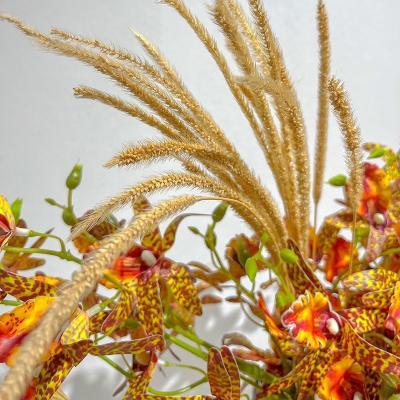 China Various Kind Of Indoor Decoration Good Quality Artificial Flower Head Orchid Stand Wedding Hold Flower Centerpieces For Bridesmaid for sale