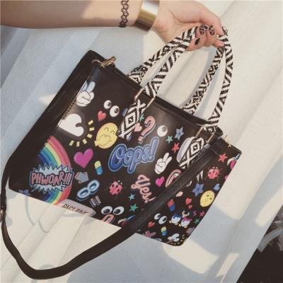 China Fashion Canton 2021 colorful printed PU leather handbags for women luxury ladies graffiti leather tote bag large handbag for sale