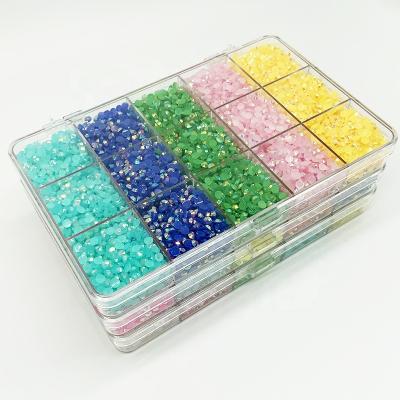 Cina Factory Same Cut Jelly Rhinestone Box Mix Size Supply Round Clear Resin Shape Jelly Flatback Base Rhinestone For Garment Decoration in vendita