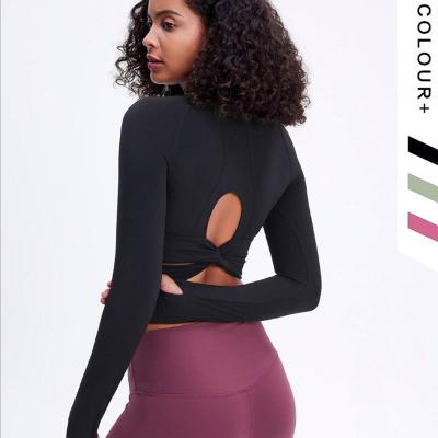 China Breathable Beauty Back Women Yoga Wear Clothing Long Sleeve Workout Top With Padding for sale