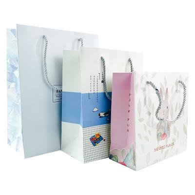 China Supplier Cheap Recyclable Custom Printed Shopping Bag Low Cost Paper Bag Color Luxury Retail Paper Bag for sale