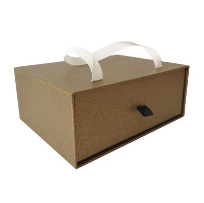 China Cartoon Recyclable Exquisite Paper Cardboard Design Packaging Cheap Paper Box With Ribbon Handle for sale