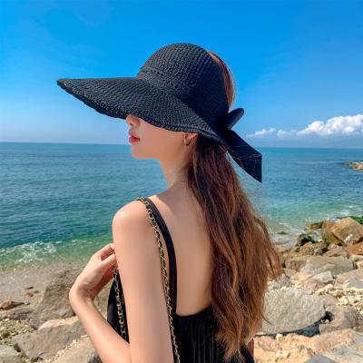 China COMMON 2021 New Design Empty Top Sunshade Hat Women Travel UV Protection Big Brim Bow Sun Hat for sale