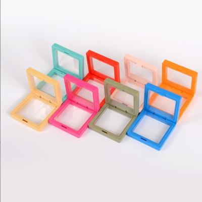 China Museum 90x90mm 3D Floating Movie Badge Corsage Display Plastic Clear Elastic Gift Box for sale