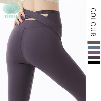 China Breathable Custom Logo Women Cross Back High Waisted Seamless Gaiters Custom Yoga Pants Sports Pants Womens Trousers for sale