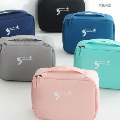 China Wholesale Fashion Folding Waterproof Polyester Wash Bag Cosmetic Women Hanging Toiletry Bag For Travel for sale