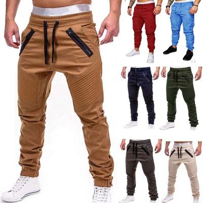 China Anti Wrinkle Hip Hop Harem Pants Joggers Anti Wrinkle Waist Multi-pocket Sportswear Tops Pants Male Cargo Pants Male Solid Slim Sweatpants for sale