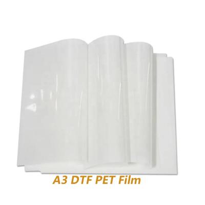 China Wholesale DTF Water Soluble White Ink Abrasion Resistance T-shirt Heat Transfer Printable PET Non Slip Film For DTF Digital Inkjet Printer for sale