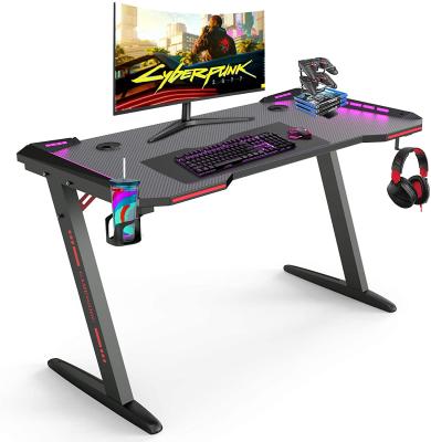 China Ergonomic Save Place Gaming Desk, Computer Table Z-Shape Workstation with RGB LED Lights, Earphone Hook and Cup Holder for Home for sale