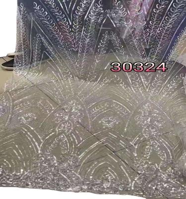 China Viable White French Tulle Lace Fabric High Quality Embroidery Sequin Lace Fabric Girl Dresses Young Lady for sale