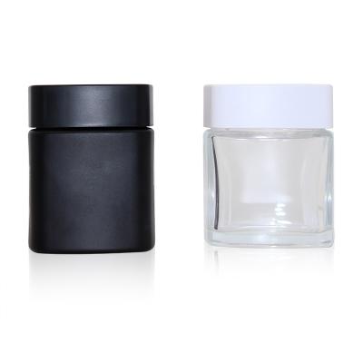 China 1oz 60ml 90ml 120ml CRC Child Safe Resistant Cosmetic Glass Jar Custom Clear Eco-Friendly Recyclable Black With Child Safe Cap For Flower for sale