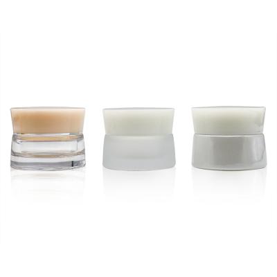 China Hot Sale Recyclable Eco-friendly 30g 50g Frosted Glass Cream Jar With White Lid 30ml 50ml Eco Friendly Cosmetic Containers for sale