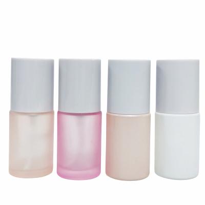 China Eco-friendly Recyclable Premium Cosmetic Packaging 30ml Pink Frosted Bottle Glass With White Gold Cap Cosmeticos Goteros De Vidrio Bottles for sale