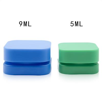 China Small 3ml 5ml 7ml 9ml Child Pill Recyclable Clear Resistant Square Wax Concentrate Small Glass Jar With Plastic Child Resistant Lid for sale