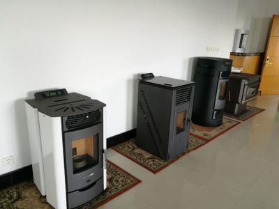 China Fogão automático interno ambiental da pelota nenhuma eletricidade para a decoração home à venda