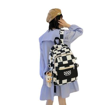 China Checkerboard Schoolbag Large Capacity Fashion Student Waterproof Backpack for sale