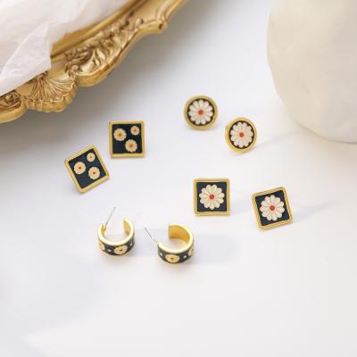 China 925 TRENDY Classic Silver Needle Vintage Daisy Earrings Enamel Embossed Flower Stud Earrings for sale