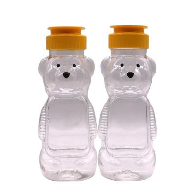 China 200ml PET Bear Plastic Honey Jars for Food Grade and Creative Student Portable Bottle for sale