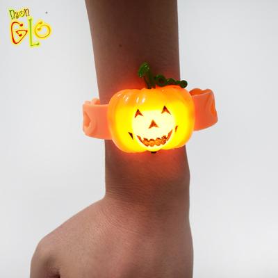 China Hot Sale TPR Halloween LED Pumpkin Wristband for sale