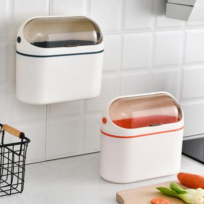 China Kitchen Viable Bin Wall Mounted Cabinet Door Home With Lid Can Hang Kitchen Waste Desktop Small Storage Basket for sale