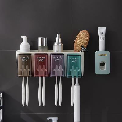 China New Product Viable Ideas Toothpaste Squeezer Bathroom Wall Mount Toothbrush Holder Storage Eco-friendly Automatic Holder for sale