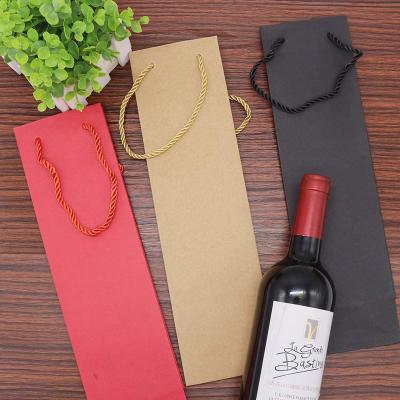 China Recycled materials paper kraft bottle wine gift bags quality paper sturdy simple wine packaging bags with handles for sale