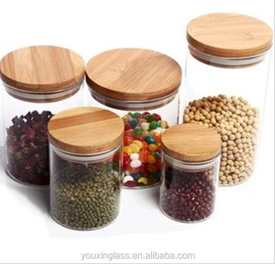 China High quality glass storage jar with wooden lid crok lid for sale