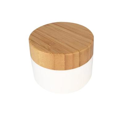 China Eco-friendly Recyclable Personal Plastic Skin Care Packaging 50g 100g PP Cosmetic Cream Jar With Bamboo Lid for sale