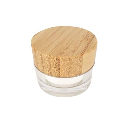 China Eco-friendly Recyclable Personal Skin Care Packing 15g 30g 50g 100g Cylinder Plastic Container Jars Acrylic Cream Jar With Bamboo Wooden Lid for sale