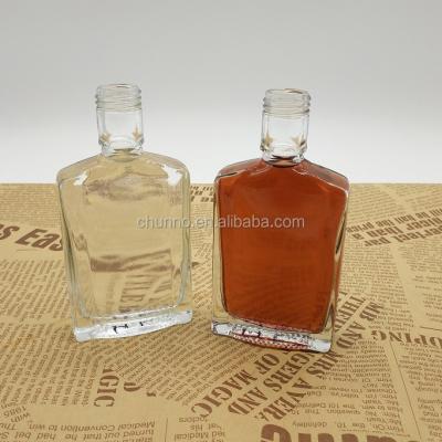 China Custom New Arrival 120ml 125ml Shape Glass Liquor Beverage Wine Bottle With Child Safe Cap for sale