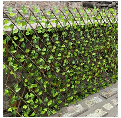 China Really Feel 2021 Custom Manufacturers Supply High Quality Green Leaf Gdjustable Artificial Fence For Home And Garden Decoration for sale