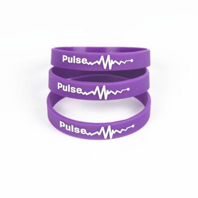 China 2021 Printing Custom Embossed White Color Silicone Wristband Religious Purple Silicone Wristbands for sale