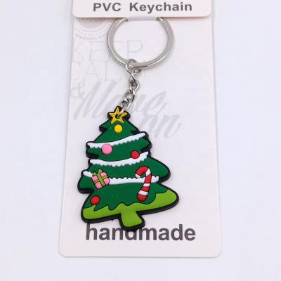 China Christmas Gifts Christmas Wrapping Gifts Different Customize Soft Rubber Christmas Favorite Cartoon Kids Key Chains PVC Key Chains for sale